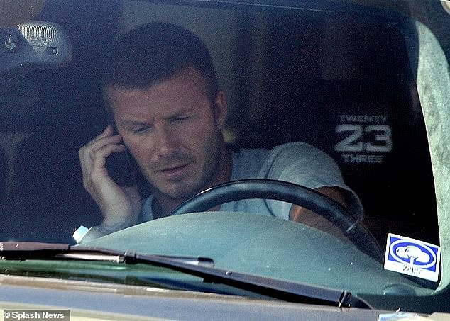 12376170-6931901-Beckham_pictured_using_his_phone_in_a_car_in_the_US_in_an_unrela-a-7_1555502989370.jpg